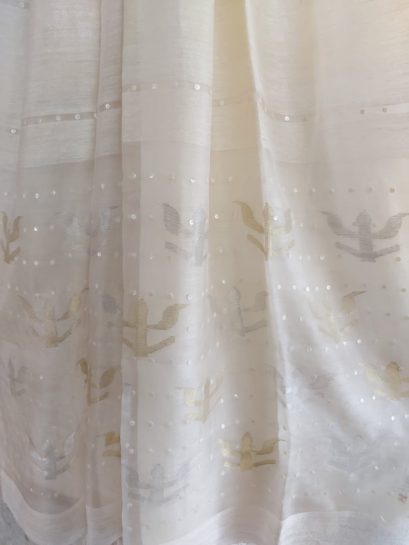 Luxurious Layers: Balaram Saha's White & Gold/Silver Matka Silk Saree (jamdani saree, silk saree, jamdani silk saree, balaram saha online, silk sarees, silk jamdani saree, bengal handloom sarees, pure silk, jamdani silk saree, matka silk, matka silk saree, jamdani silk saree online)  https://www.google.com/business/